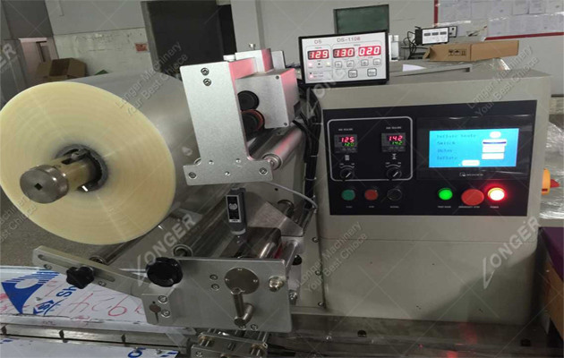 details of peanut brittle making machine